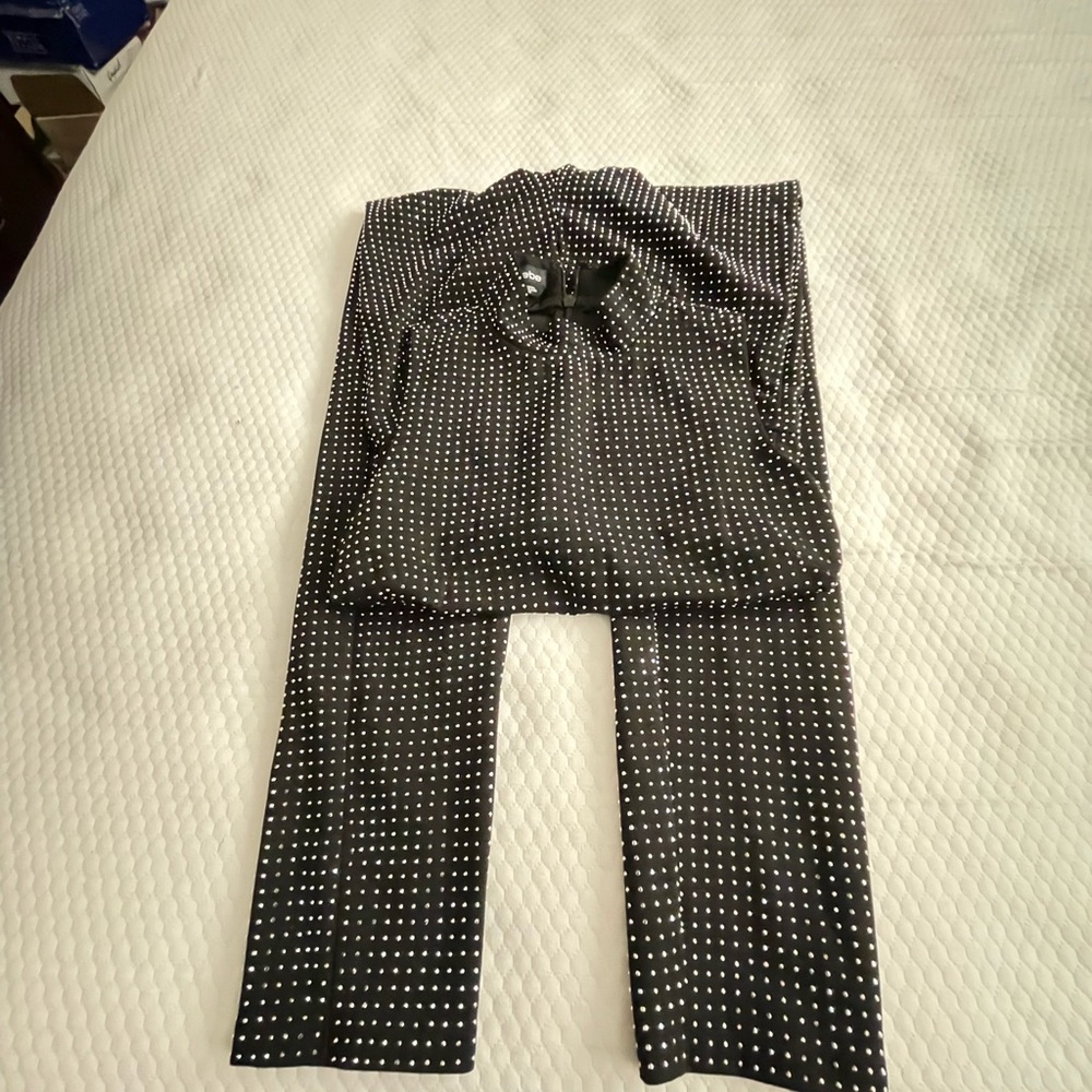 BEBE jumpsuit black and silver medium size in god conditions no holes or stains